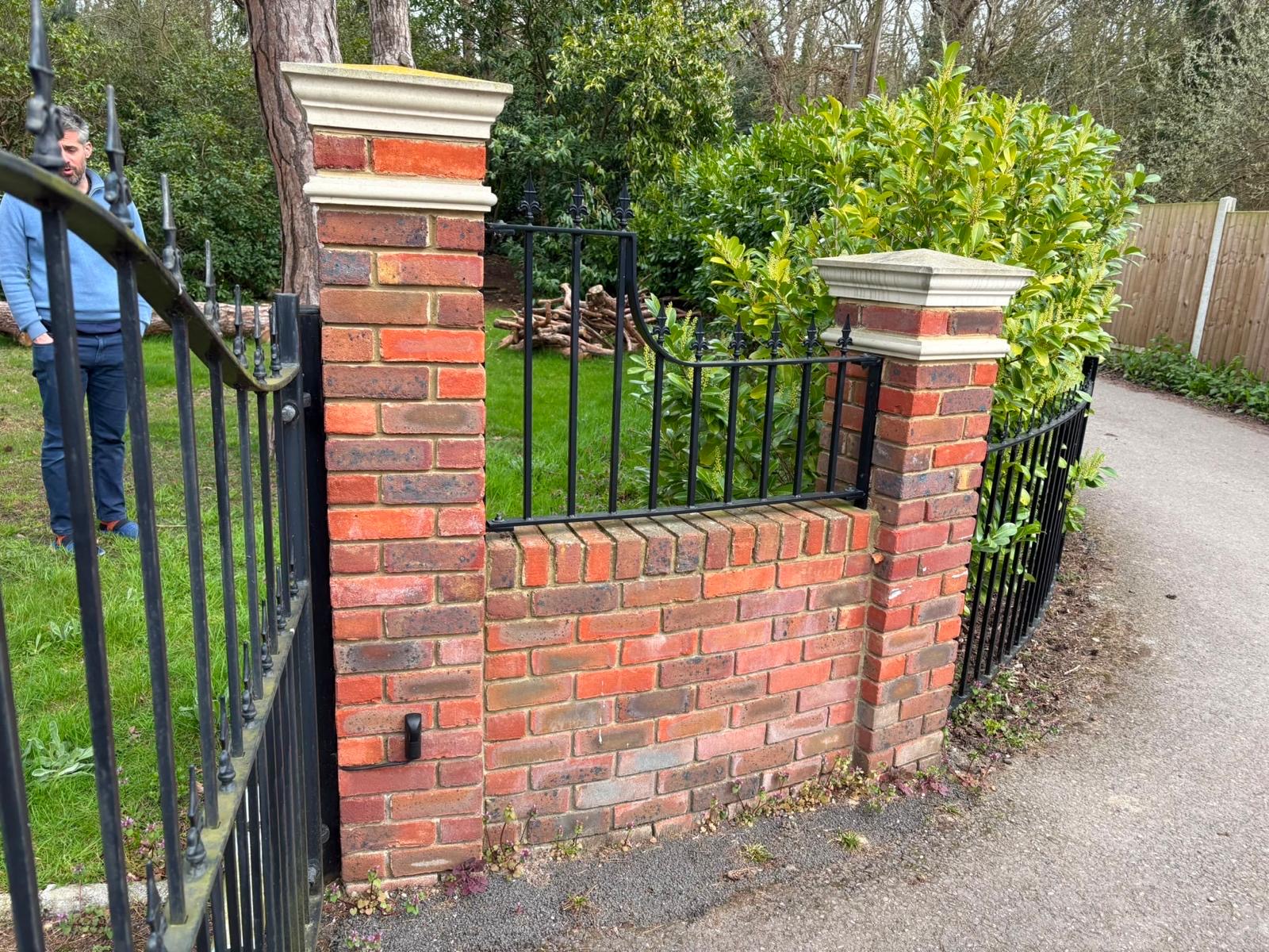 Finished red brick garden wall, piers and railings
